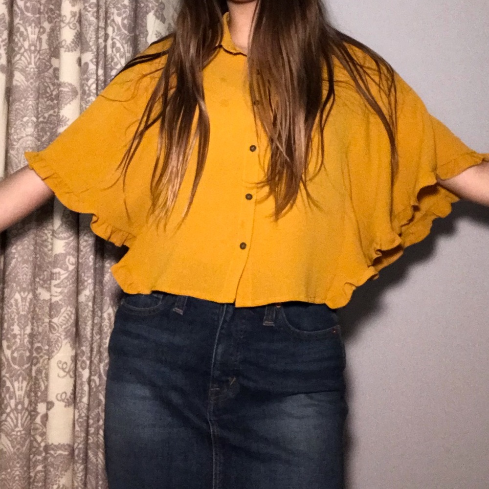 Yellow/orange bat winged shirt